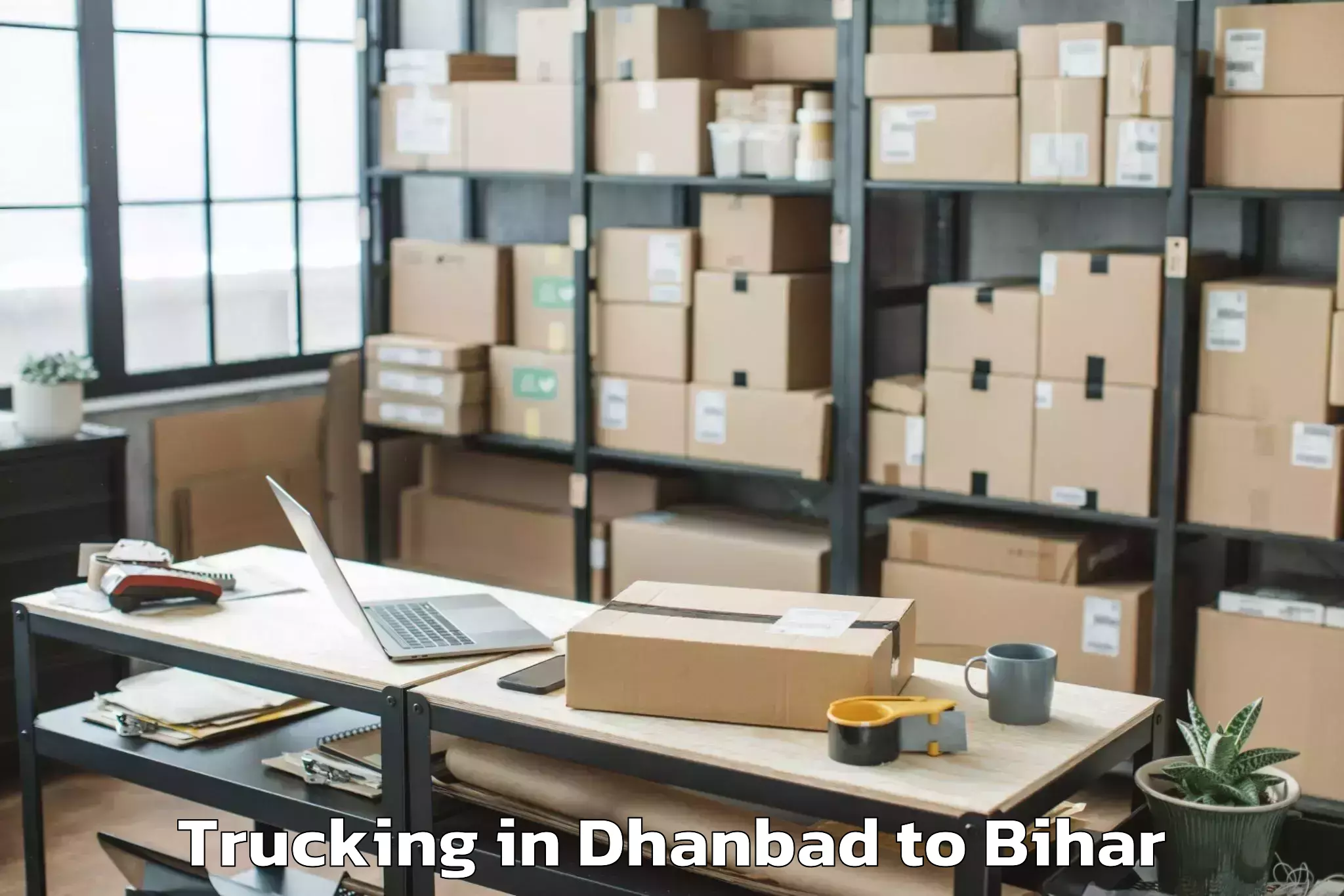 Get Dhanbad to Bakhri Trucking